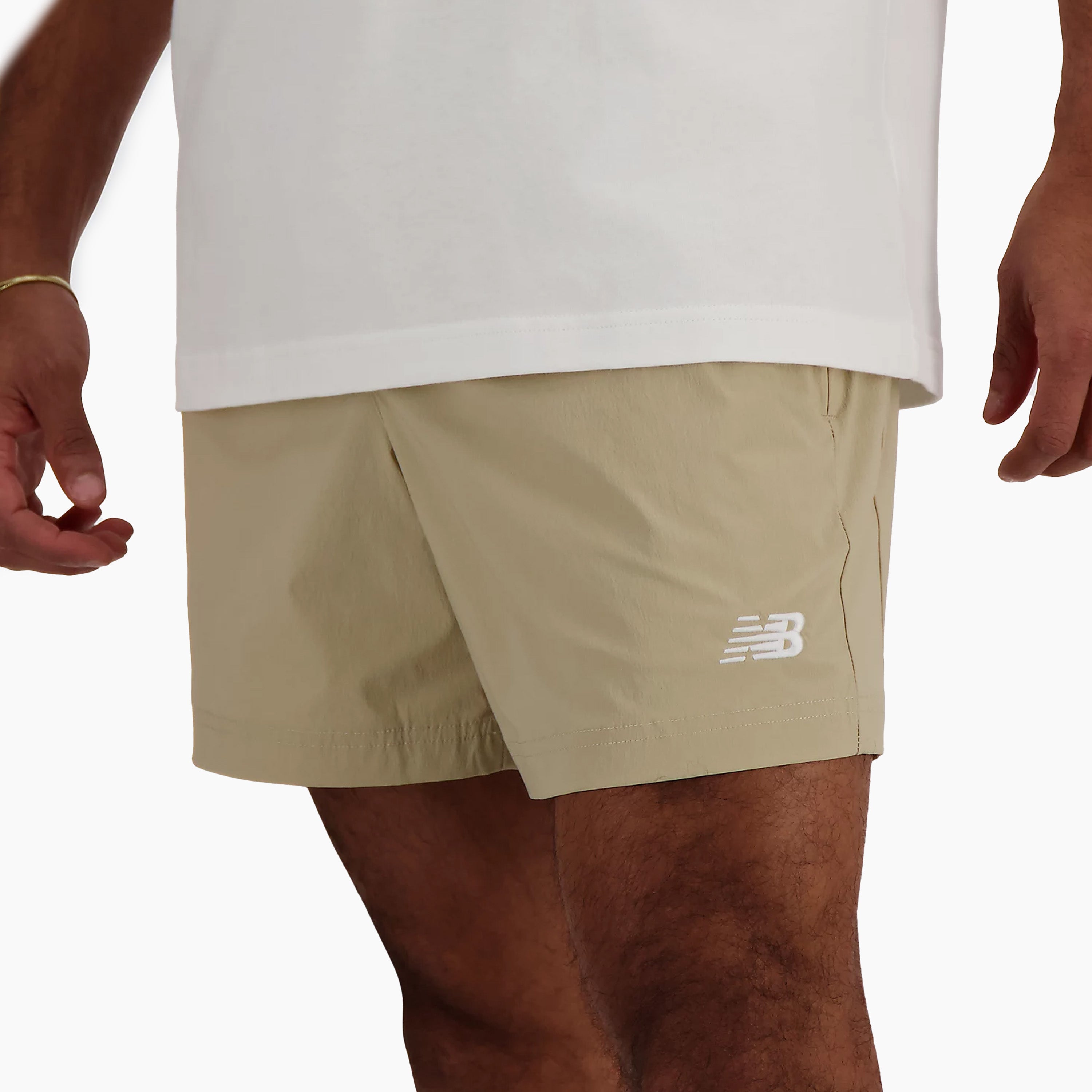 NEW BALANCE ATHLETICS SHORT TISSÉ STRETCH EN GRÈS - MS41517