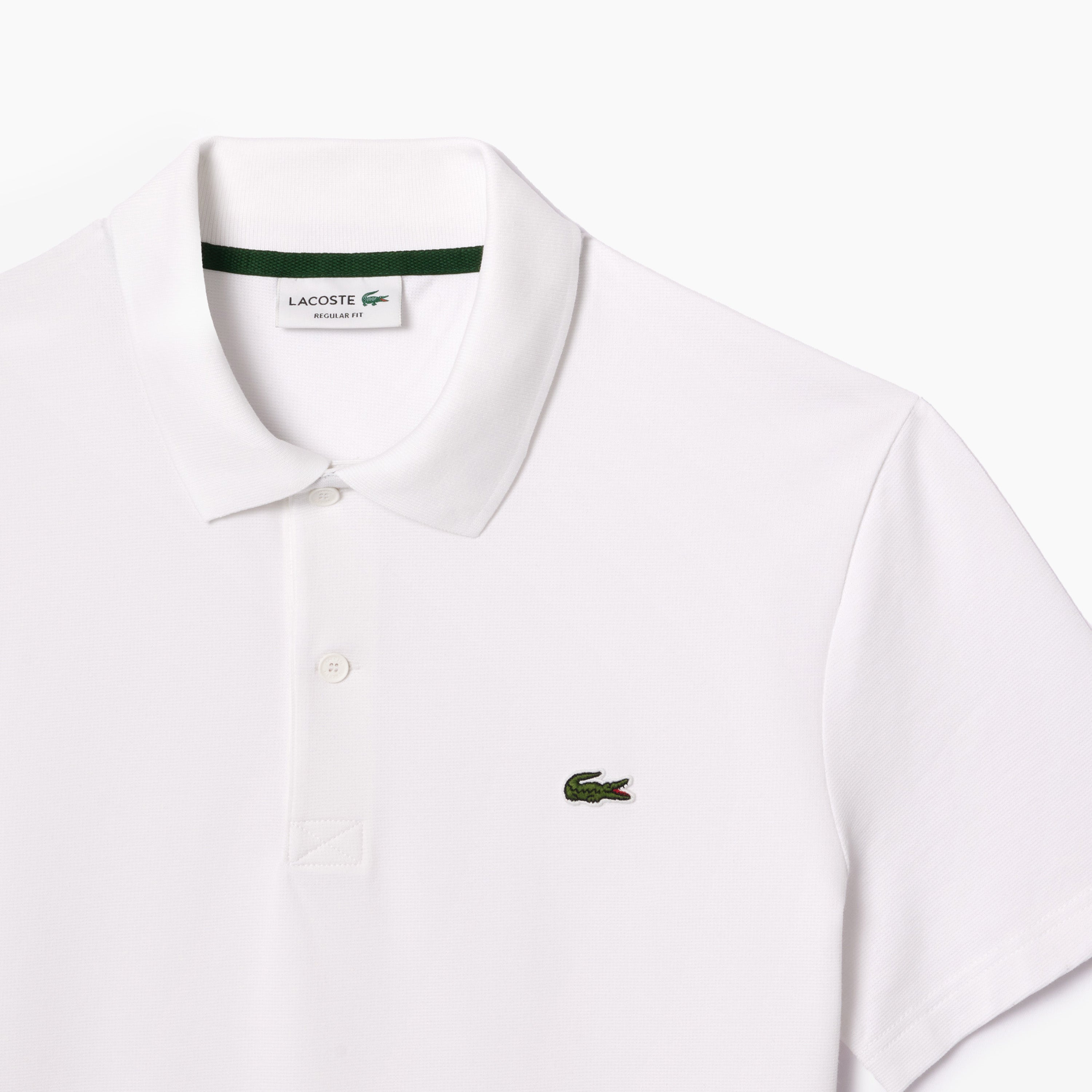 Polo Lacoste Hombre | Apuesta por un look impecable con este emblemático polo. Promete una sensación de ligereza dondequiera que vayas. Estilo y comodidad en todo momento.