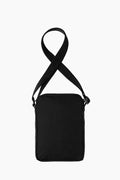 Bandolera Carhartt | ¡Lleva todo lo que necesitas con facilidad con la Hasta Shoulder Bag, una bandolera en negro fabricada de algodón y nailon ripstop para una resistencia única. Es repelente al agua para proteger tus pertenencias. Cierre de botones y cremallera.  