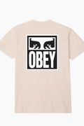 Obey Camisetas para Hombre - Consigue un estilo único con la camiseta Eyes Icon II T-Shirt en color crema. Hecha de algodón y poliéster, esta camiseta presenta estampados gráficos y un corte box fit para un look moderno y cómodo. Su peso pesado asegura una durabilidad que te acompañará en todas tus aventuras.