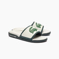 Chanclas Lacoste | Chanclas Lacoste Hombre | Las Serve Slide cuentan con una suela de doble densidad fabricada a partir de una plantilla blanda para garantizar la comodidad bajo los pies, mientras que la tira moldeada está recubierta de espuma. Forro fabricado con una suave malla y diseño se completa con el emblemático cocodrilo.