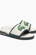 Chanclas Lacoste | Chanclas Lacoste Hombre | Las Serve Slide cuentan con una suela de doble densidad fabricada a partir de una plantilla blanda para garantizar la comodidad bajo los pies, mientras que la tira moldeada está recubierta de espuma. Forro fabricado con una suave malla y diseño se completa con el emblemático cocodrilo.