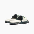 Chanclas Lacoste | Chanclas Lacoste Hombre | Las Serve Slide cuentan con una suela de doble densidad fabricada a partir de una plantilla blanda para garantizar la comodidad bajo los pies, mientras que la tira moldeada está recubierta de espuma. Forro fabricado con una suave malla y diseño se completa con el emblemático cocodrilo.