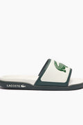 Chanclas Lacoste | Chanclas Lacoste Hombre | Las Serve Slide cuentan con una suela de doble densidad fabricada a partir de una plantilla blanda para garantizar la comodidad bajo los pies, mientras que la tira moldeada está recubierta de espuma. Forro fabricado con una suave malla y diseño se completa con el emblemático cocodrilo.