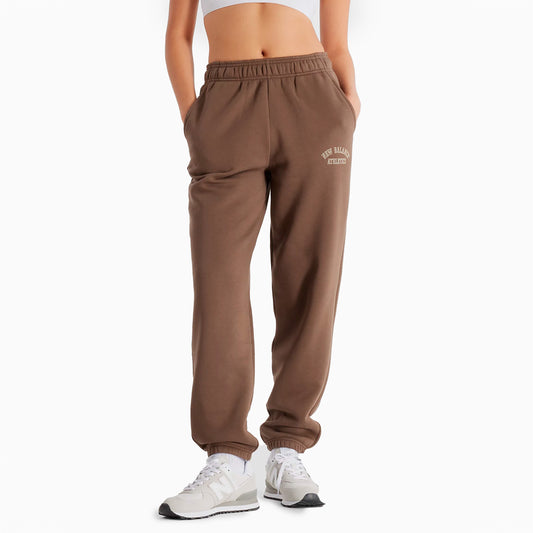 NEW BALANCE SEASONAL W' GRAPHIC SWEATPANT BROWN - WP43500