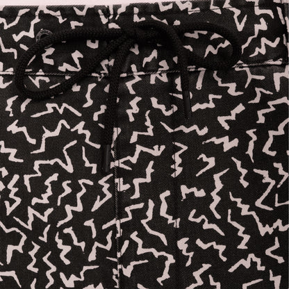 Pantalones Cortos para Hombre | Pantalones Volcom | Pantalón corto con cintura elástica para hombre. Presenta una costura externa de 46cm para una talla M. Corte recto y estampado integral además de bolsillos delanteros y un corte trasero asimétrico.