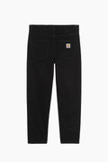 Pantalones Carhartt Vaqueros Hombre Newel Pant en color negro fabricado en tejido denim 'Maitland' de algodón orgánico de ajuste cónico relajado de 13.5 Onzas con detalles que mejoran la calidad del pantalón como las costura de presilla en el yugo trasero de la cintura normal o remaches en puntos vitales de tensión sin duda un pantalón vaquero carhartt wip perfecto para cualquier ocasión. 