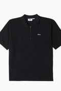 Polo de manga corta para hombre con textura de jacquard | Polo de manga corta en color negro para hombre fabricado en algodón al 100%, presenta un gramaje de 6.5 onzas y un ajuste regular para conseguir un fit perfecto. Detalles acanalados. 